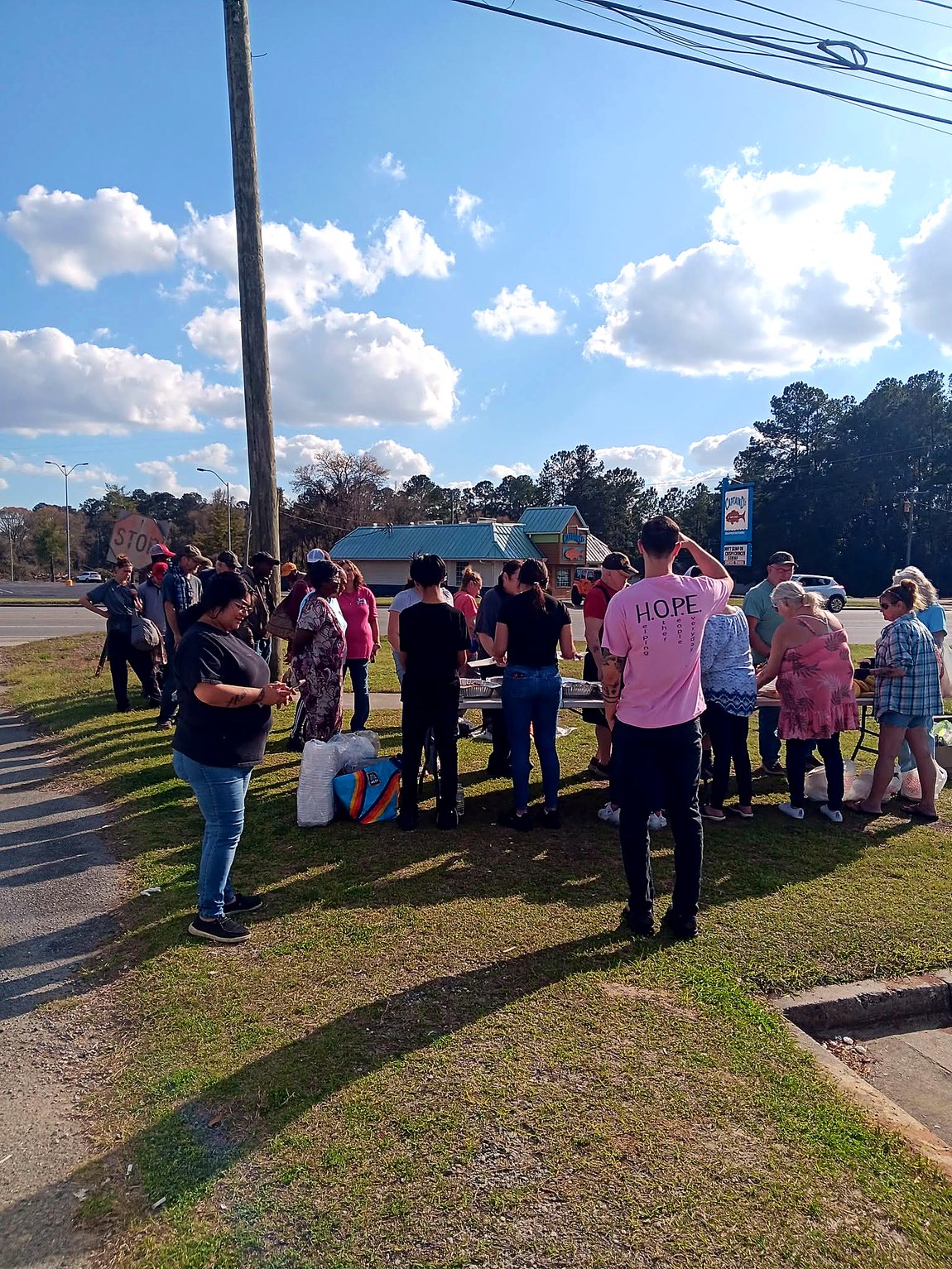The Hope Ministry team gathered in prayer before serving