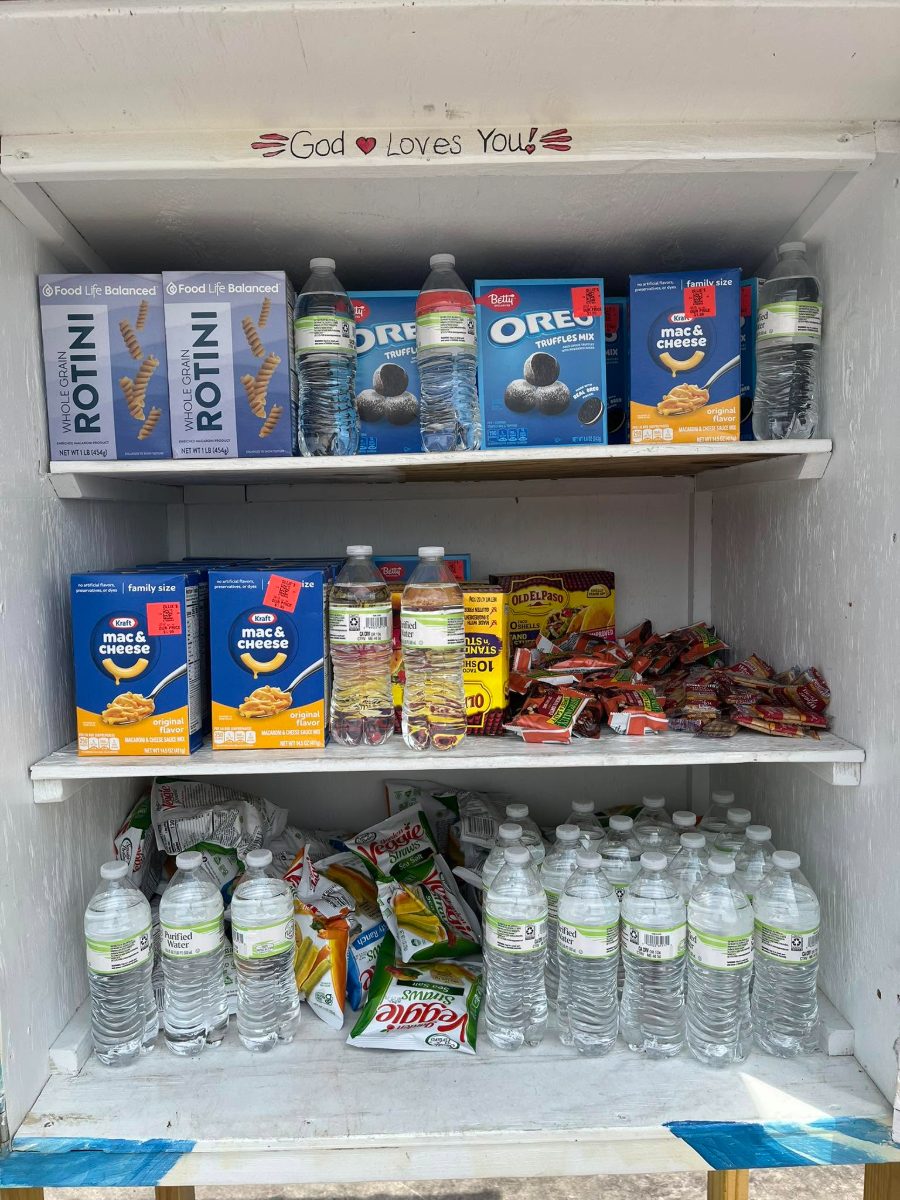 Lily's Blessing Box shelves filled with hygiene items and drinks